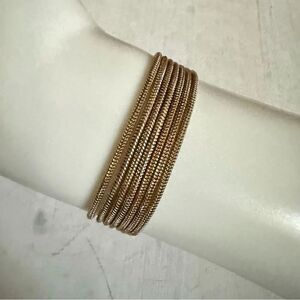 Gold tone multi chain bracelet